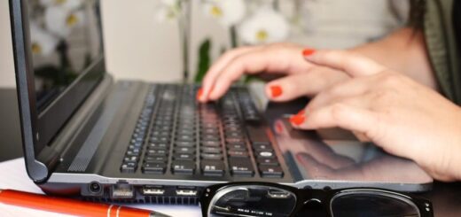 person woman desk laptop